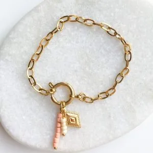Schakelarmband party ruitje goud/zalm
