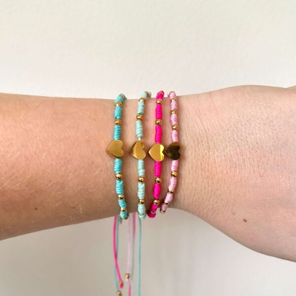 Gevlochten armbandje hartje met bolletjes