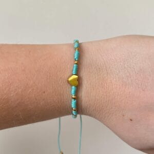Gevlochten armbandje hartje met bolletjes - blauw/goud 1
