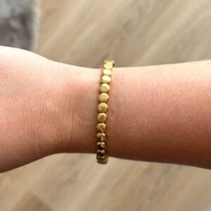 Gouden bangle met rondjes